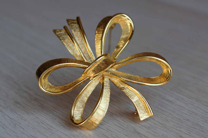 Monet (New York, USA) Gold Tone Tied Bow Brooch