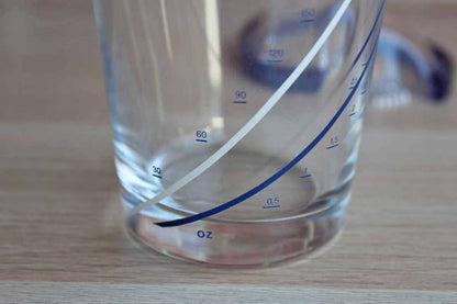 Mix N' Measure Glass Measuring Cup with Plastic Removable Lid