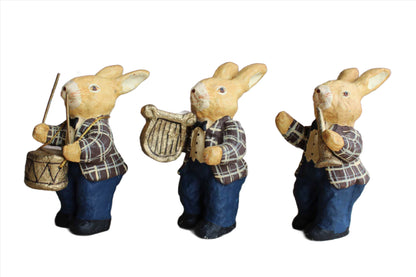 Three Faux Wood Painting Rabbits Playing Instruments