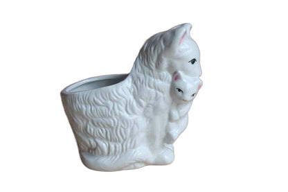 Glossy White Porcelain Planter of a Mother Cat Holding Kitten with Her Mouth