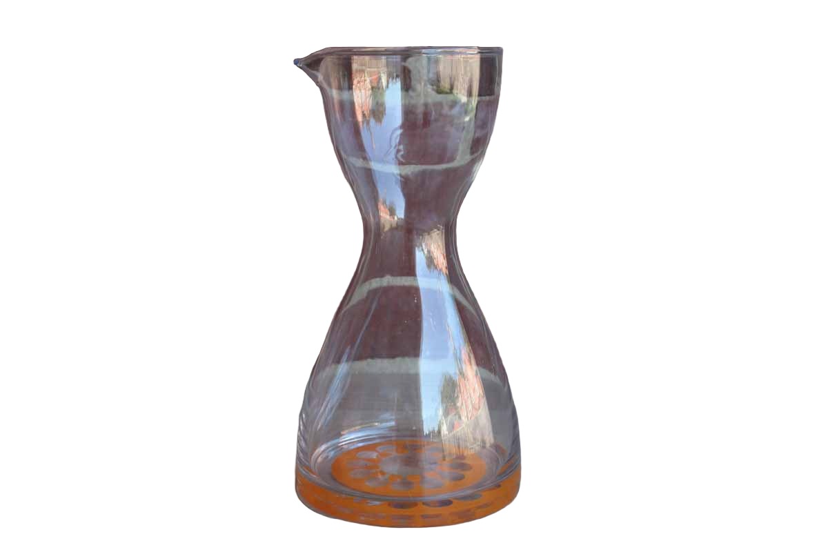 Clear Glass Juice Carafe with Graphic Orange Design on the Bottom