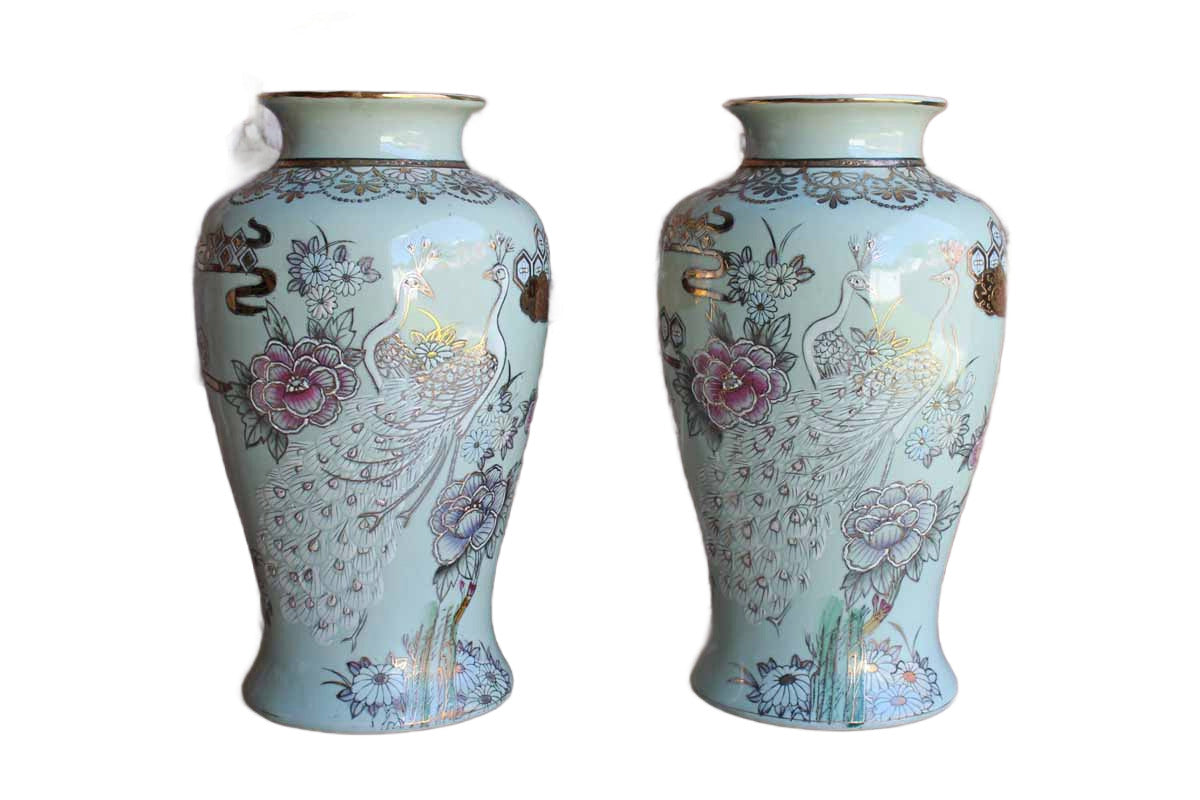 Baluster Shaped Moriaged Vases Depicting Lilac, Gold and White Peacocks and Flowers Over an Off White Background