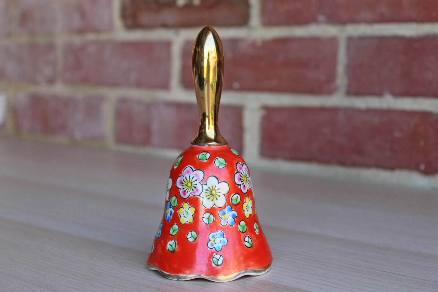 Ceramic Bell Painted with Colorful Flowers and Gold Stem