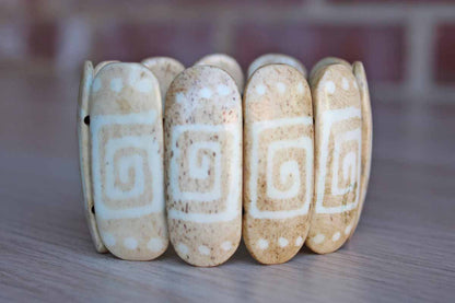 Hand Carved and Decorated Stone Bracelet Set on Elastic Bands