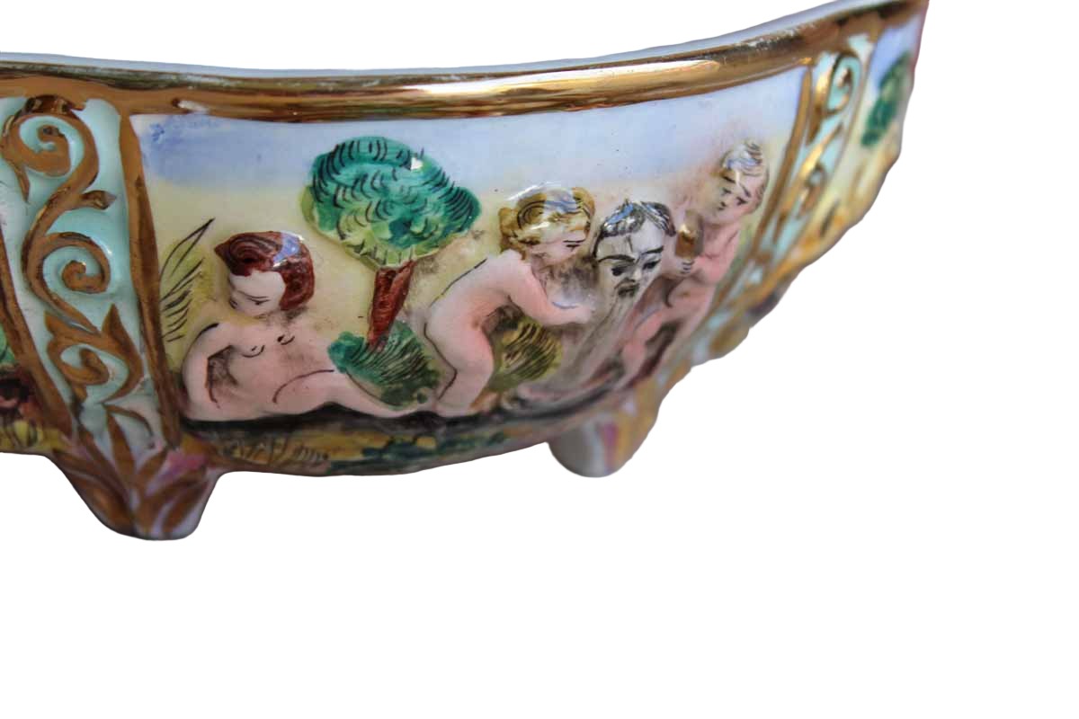 Italian Capodimonte Covered Dish with Raised Cherubs. Dogs, and Lion Finial