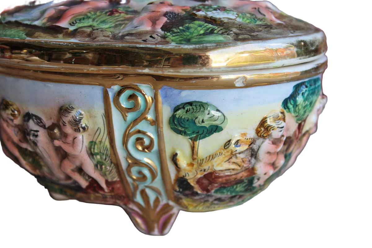 Italian Capodimonte Covered Dish with Raised Cherubs. Dogs, and Lion Finial