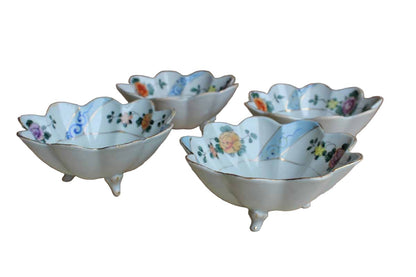Porcelain Footed Bowls Decorated with Handpainted Flowers and Gilded Rims, 4 Pieces
