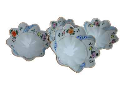 Porcelain Footed Bowls Decorated with Handpainted Flowers and Gilded Rims, 4 Pieces