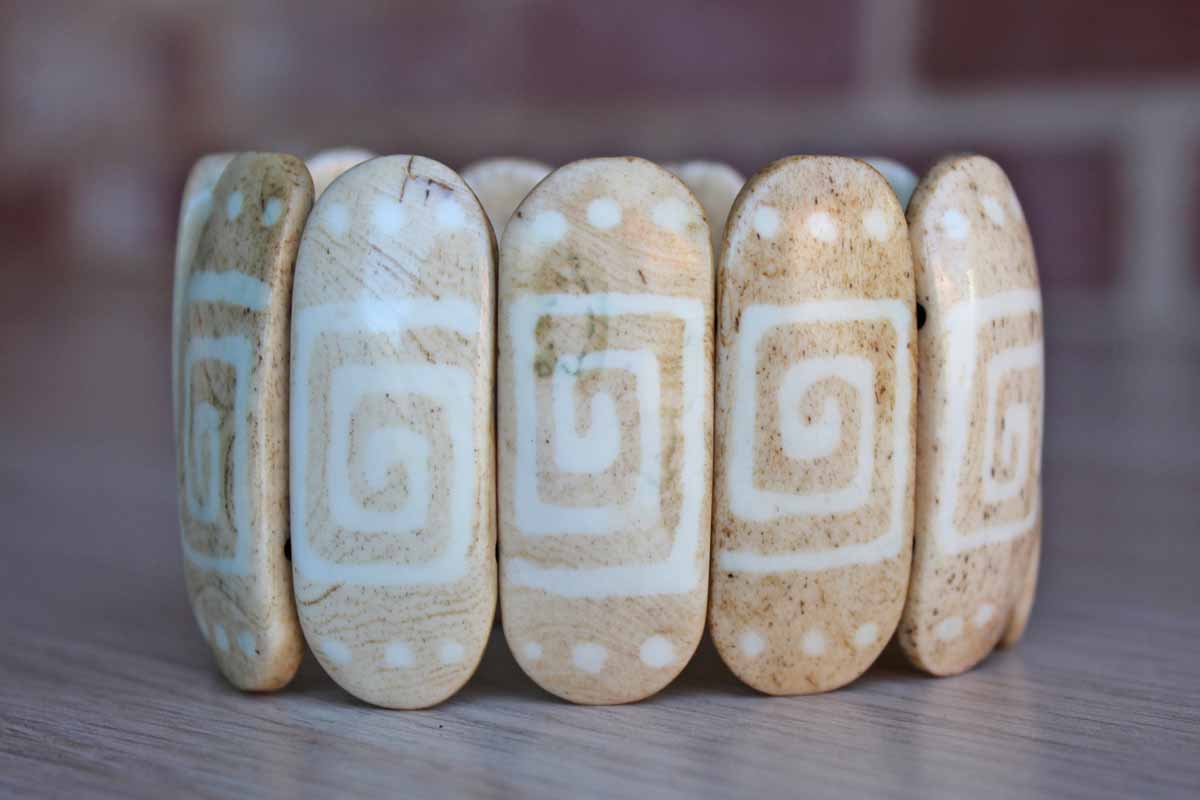 Hand Carved and Decorated Stone Bracelet Set on Elastic Bands