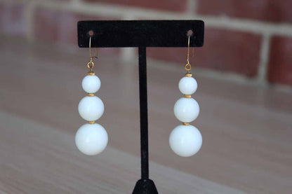 White Dangling Bead Pierced Earrings with Gold Tone Spacers
