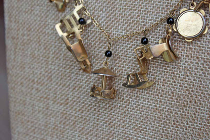 Gold Tone Necklace with Baby Charms