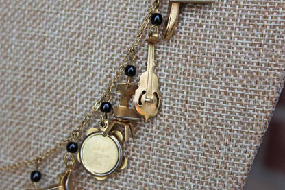Gold Tone Necklace with Baby Charms