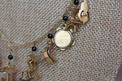 Gold Tone Necklace with Baby Charms