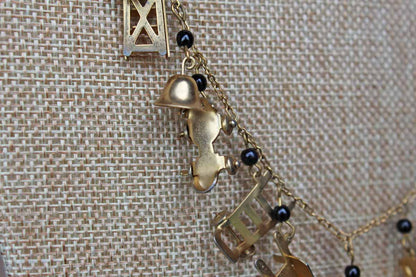 Gold Tone Necklace with Baby Charms