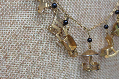 Gold Tone Necklace with Baby Charms