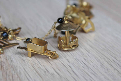 Gold Tone Necklace with Baby Charms