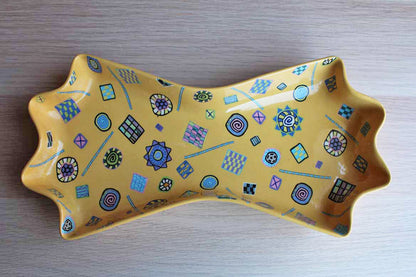 Bow Tie-Shaped Ceramic Dish with Colorful Millefiori-Style Shapes and Designs