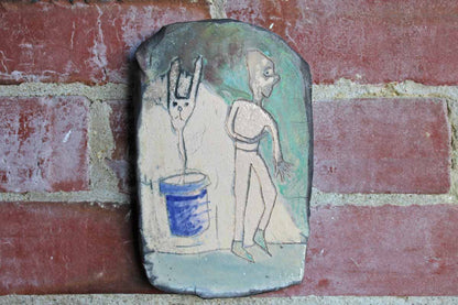 Handmade Ceramic Wall Art of Dreamlike Faces and Potted Rabbit