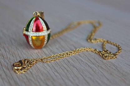 Gold Tone Colorfully Enameled Egg Locket on a Gold Chain