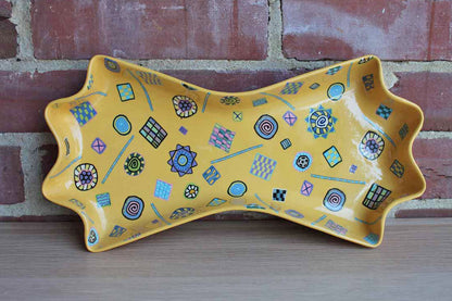 Bow Tie-Shaped Ceramic Dish with Colorful Millefiori-Style Shapes and Designs