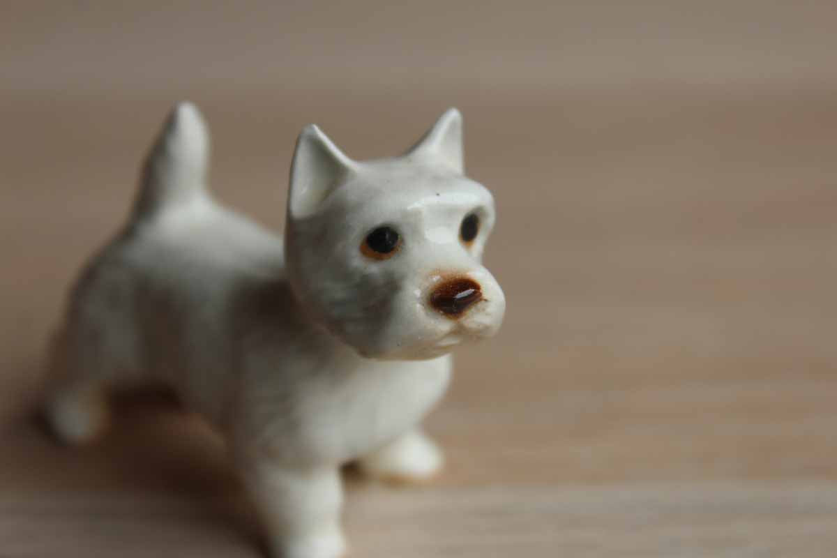 Tiny Ceramic Figurine of a White Terrier Standing at Attention