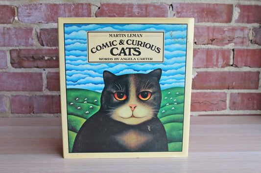 Comic & Curious Cats by Martin Leman, Words by Angela Carter