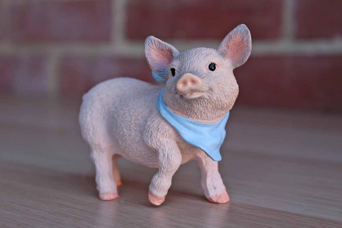 Little Pink Resin Pig Wearing a Blue Bandana