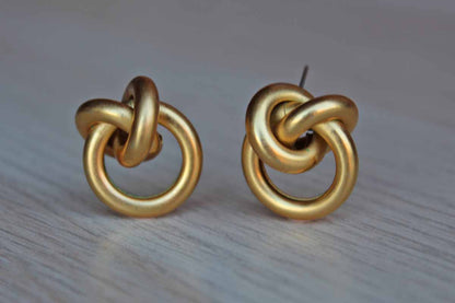 Gold Tone Pierced Earrings Shaped Like Knots