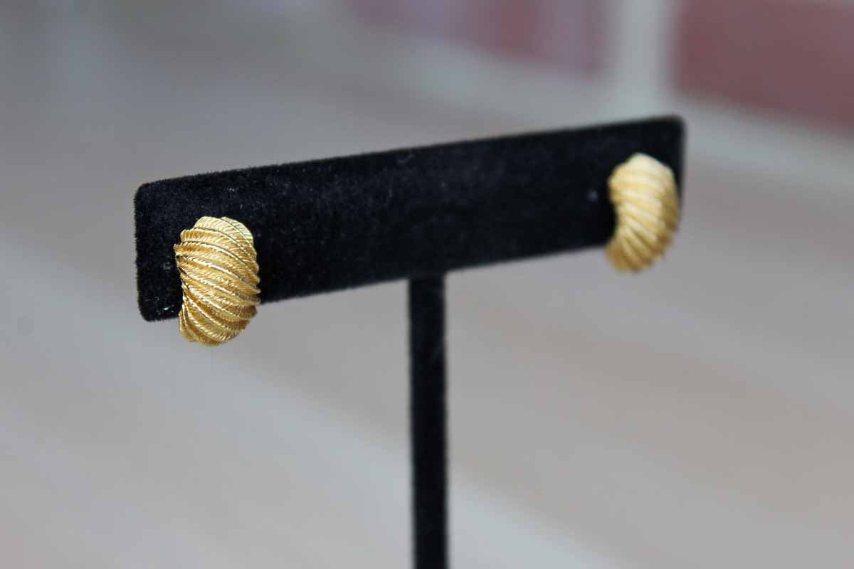 Gold Tone Pierced Earrings with Curved Shape and Ridged Details