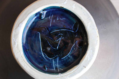 Handmade Black Ceramic Bowl with Colorfully-Painted Bird in the Center