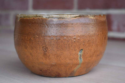 Primitive Old Stoneware Bowl with Dark Gold and Off-White Glazes
