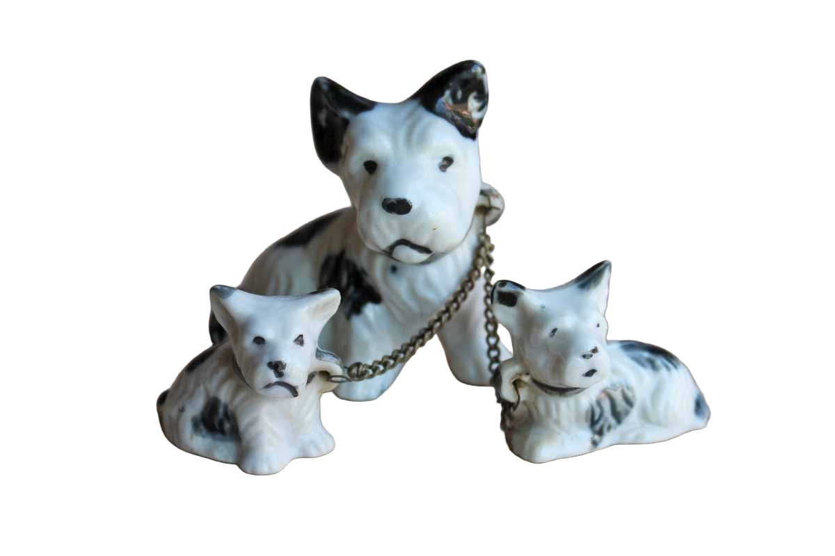 Set of Three Black and White Porcelain Terriers on Chain Leashes