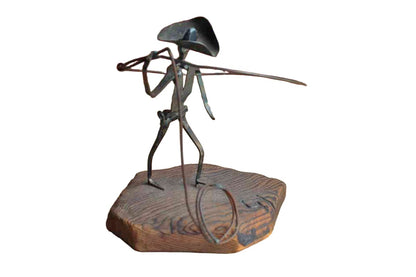 Metal Lassoing Cowboy Sculpture