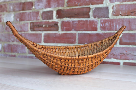 Rustic Canoe-Shaped Handmade Basket with Naturally Aged Finish