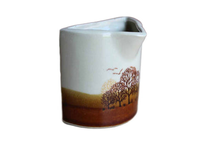 Small Ceramic Cream or Syrup Pitcher with Hand-Painted Trees and Birds