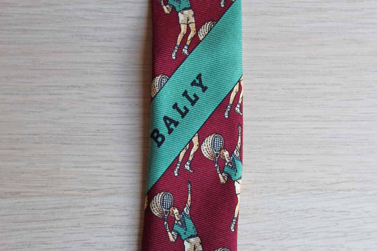 Bally (Switzerland) 100% Silk Necktie Decorated with a Tennis Player in Mid-Serve