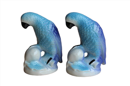 Ceramic Blue Parrots Clutching Flowering Fruit, A Pair