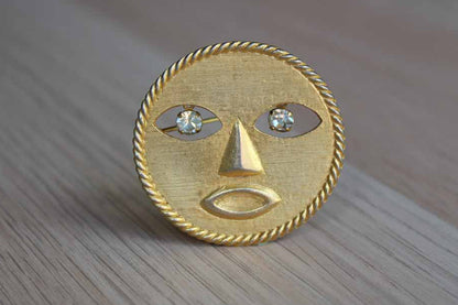 Jeanne (New York) Gold Tone Modern Sun Brooch with Dangling Silver Rhinestone Eyes