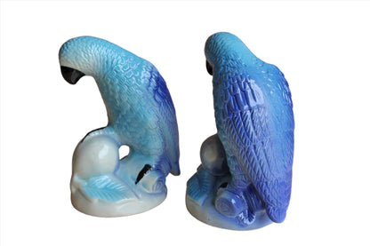 Ceramic Blue Parrots Clutching Flowering Fruit, A Pair