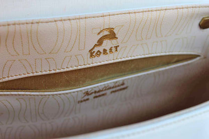Koret (New York, USA) Korettalak Shiny White Handbag with Gold Tone Detailing