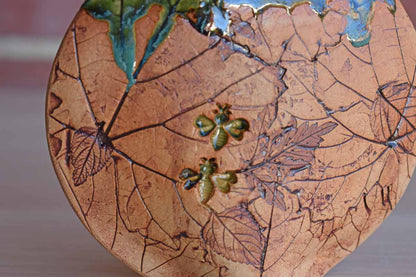 Small Pillow Vase with Incised Leaf and Bee Designs