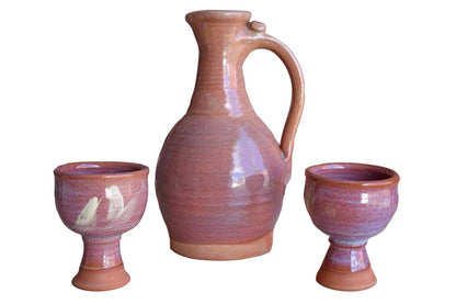 Pink Stoneware Decanter and Pair of Goblets