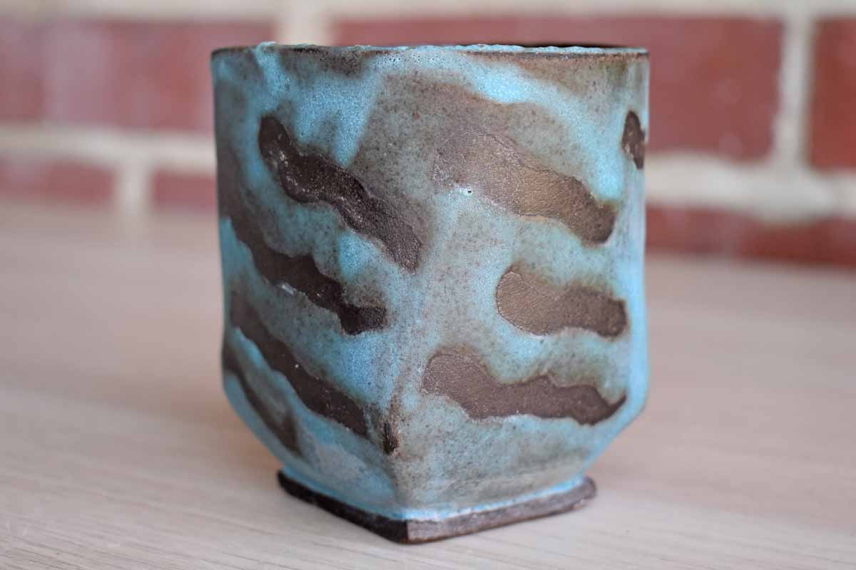 Blue Stoneware Cup with Serpentine Designs
