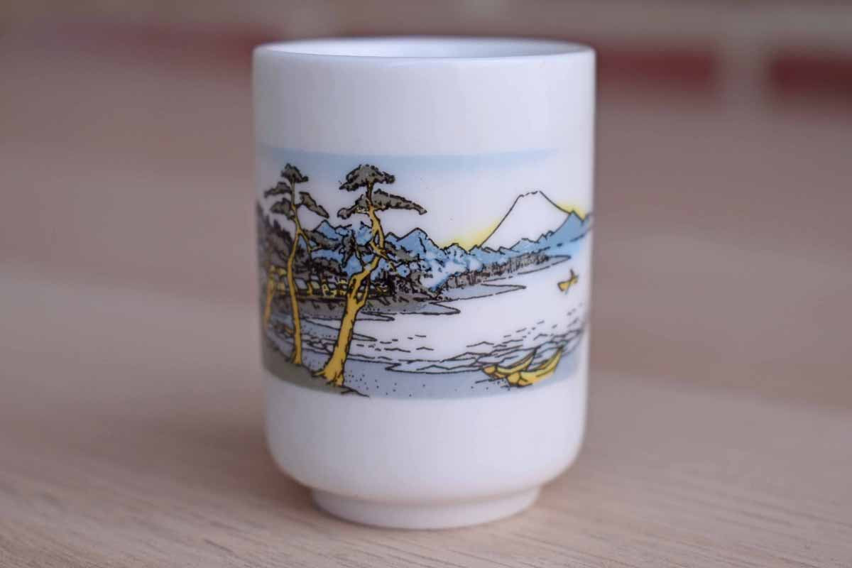Tiny Porcelain Cup with Mountain and Boat Scene